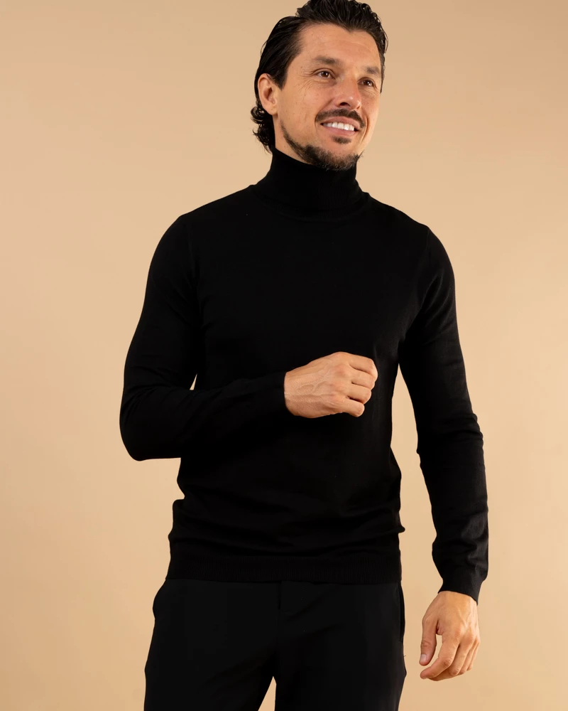 Pull col roulé
