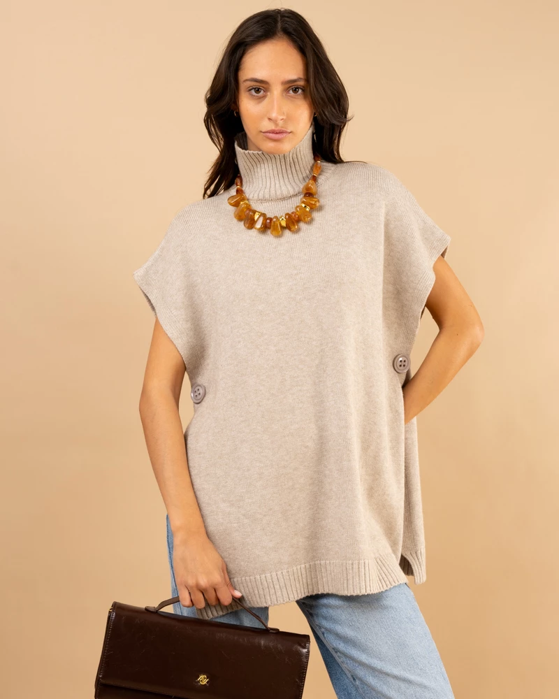 Poncho col roulé