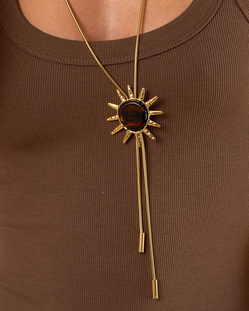 Collier long soleil